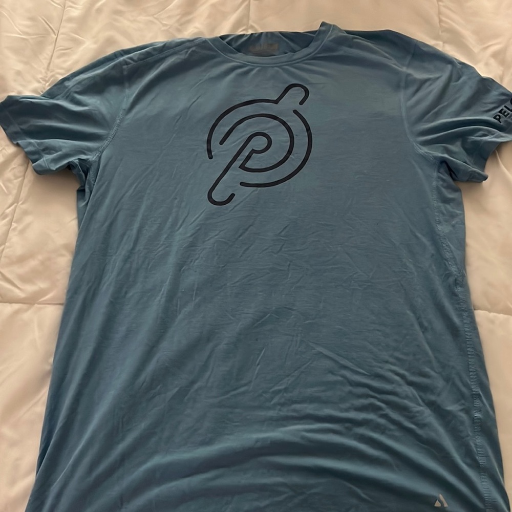 Peloton Baby Blue Solfire T shirt Medium